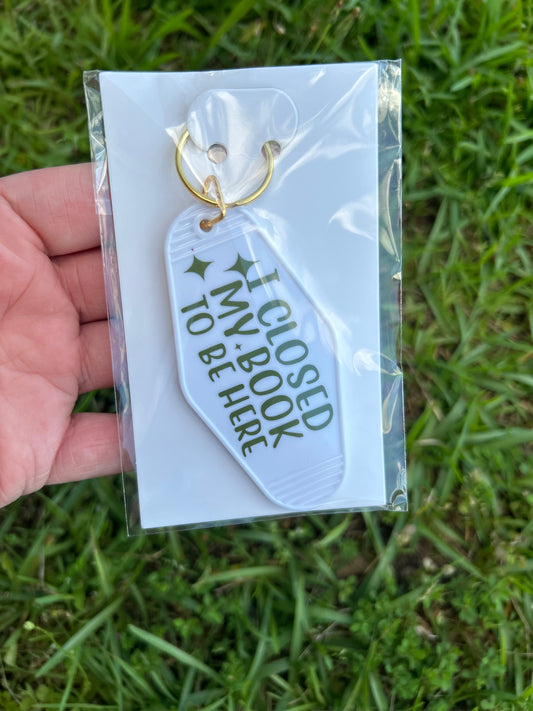 I closed my book to be here keychain - white and green